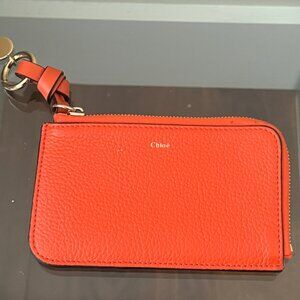 CHLOE orange wallet.